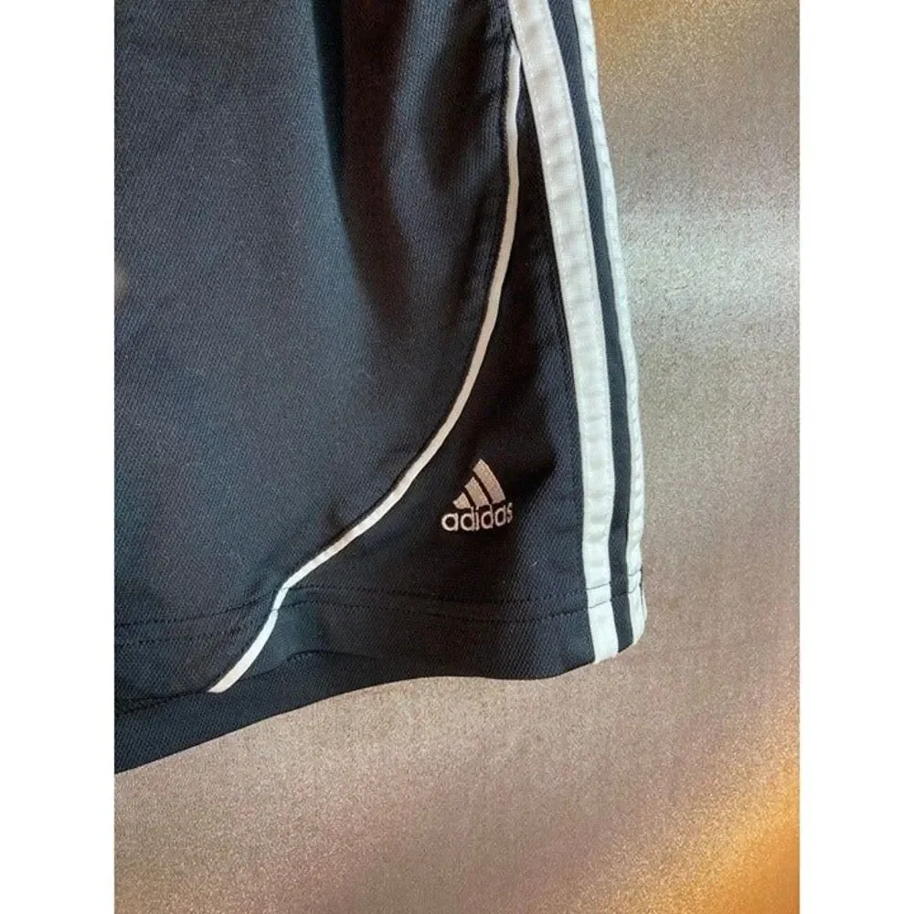 Adidas black gym shorts with 3 white stripes drawstring.